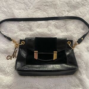 Elegant Black and Gold Women's Bag